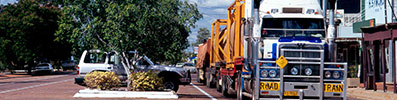 Heavy vehicle truck passing through town